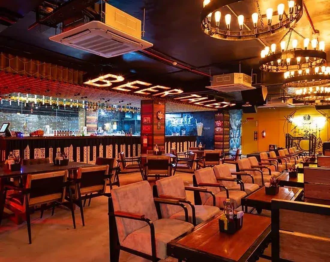The warm wood-and-brick interior of BeerTales brewery and bar in Dehradun