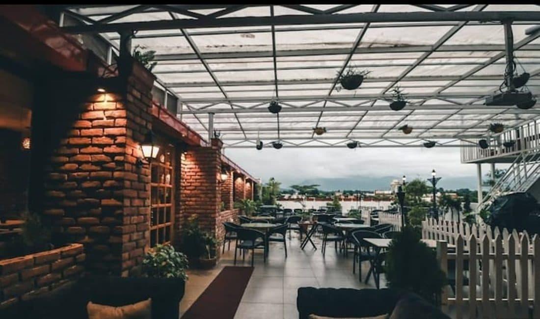 Tonic rooftop gastropub in Dehradun, string lights and terrace seating