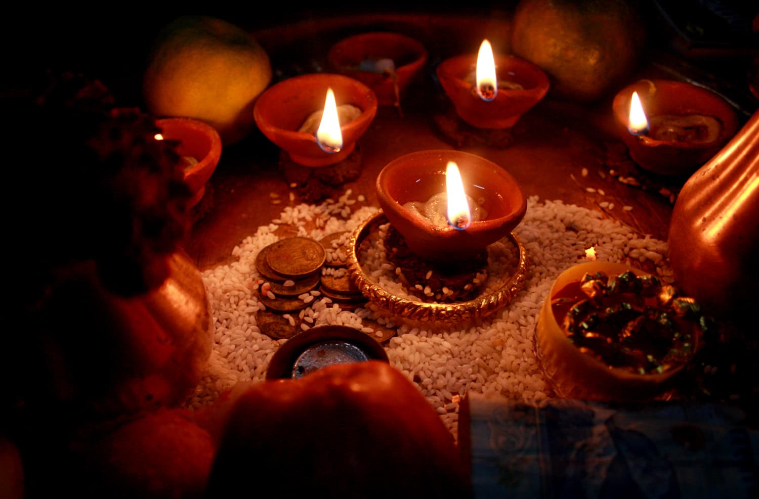 Clay diya oil lamps glowing during the Diwali festive season