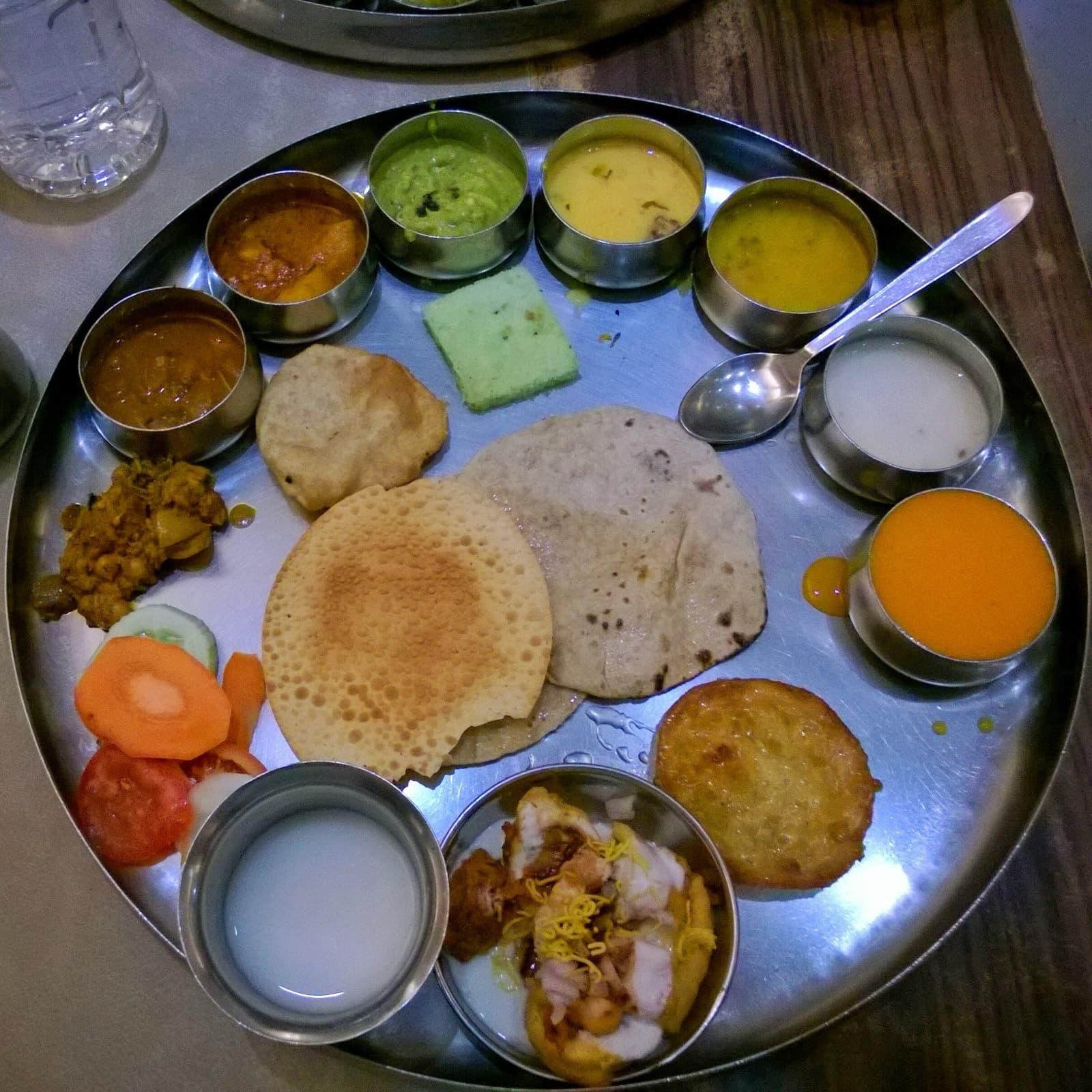 A loaded Indian thali with curries, breads and chaat in Dehradun