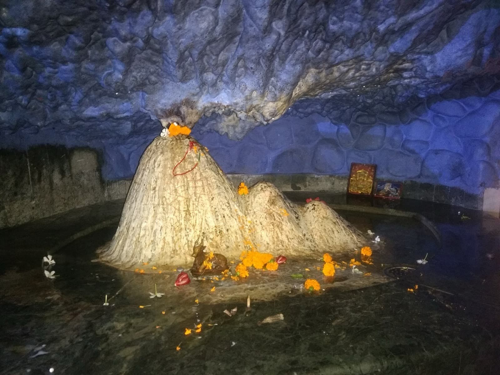 The cave shrine at Tapkeshwar Mahadev temple beside the Tons stream in Dehradun